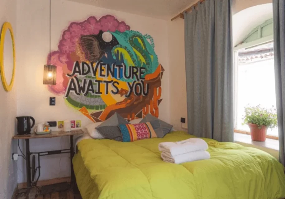 Yellow Room - Habitación Compartida 8 camas - Hospedaje Cusco Supertramo Cusco Hostel